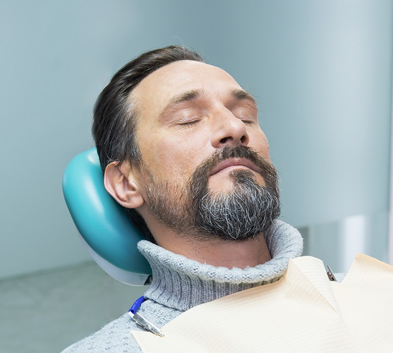 Man relaxed during sedation dentistry visit