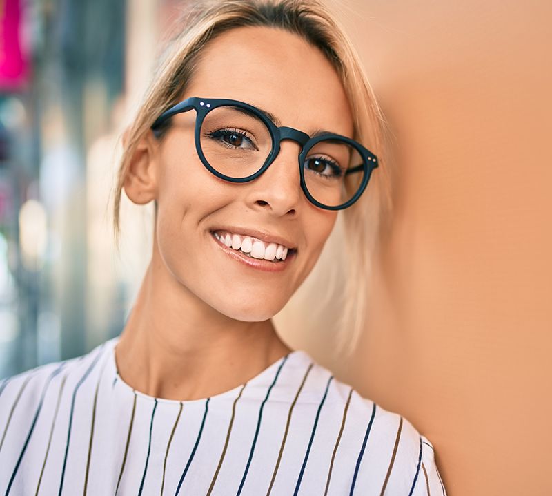 Woman with gorgeous smile after cosmetic dentistry