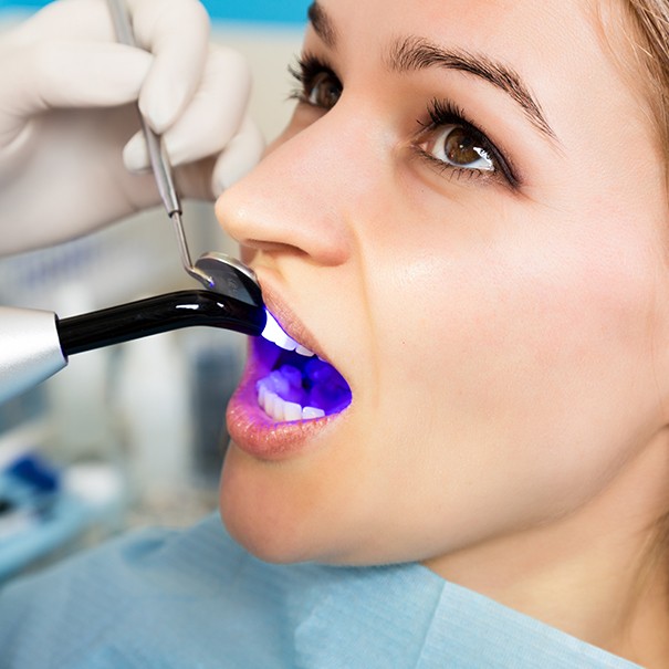 Patient receiving cosmetic dental bonding treatment