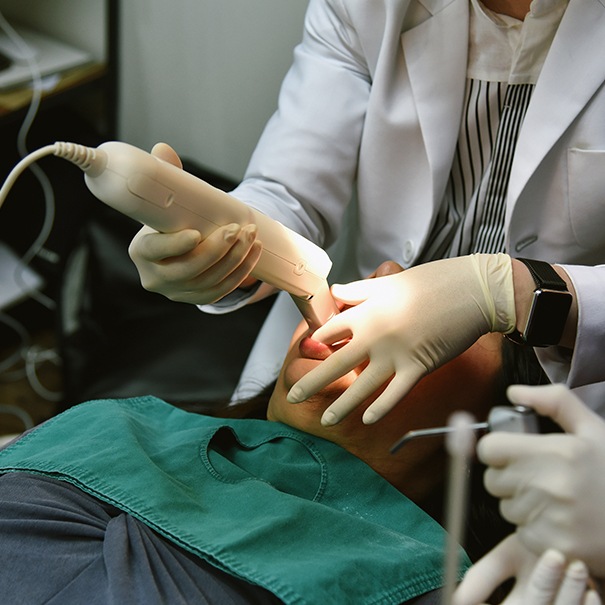 Dental team member capturing digital impressions