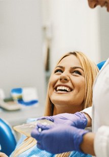 patient smiling during checkup