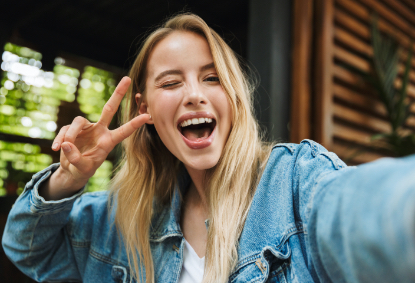 Woman with flawless smile after cosmetic dentistry