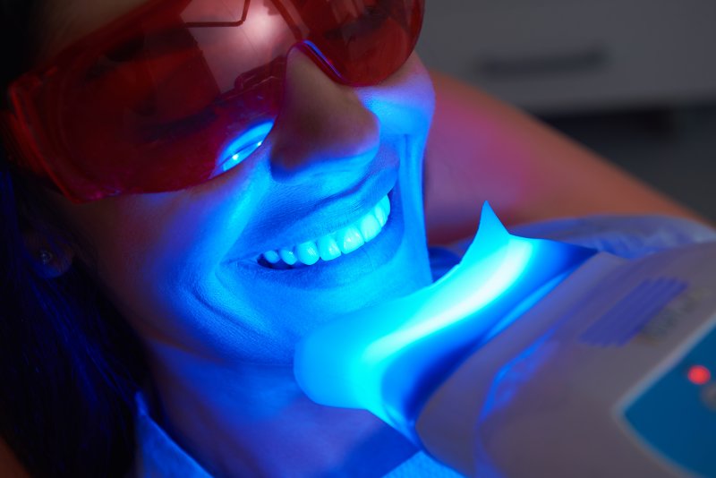 A patient receiving teeth whitening