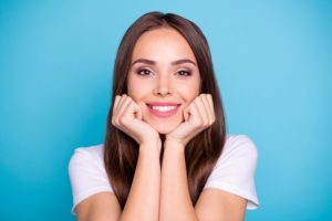 Woman with brown hair smiling