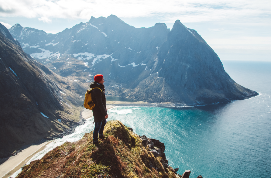 Backpacker on a mountain top